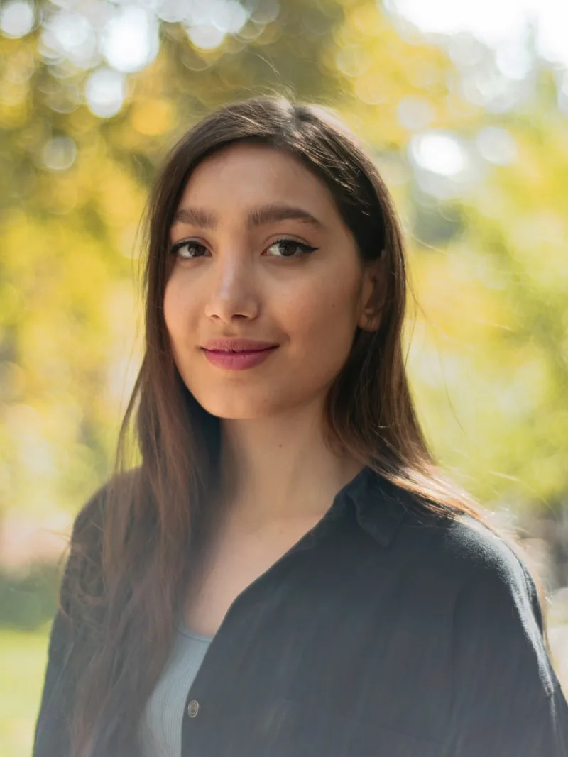 Professional headshot with natural light — approachable and confident