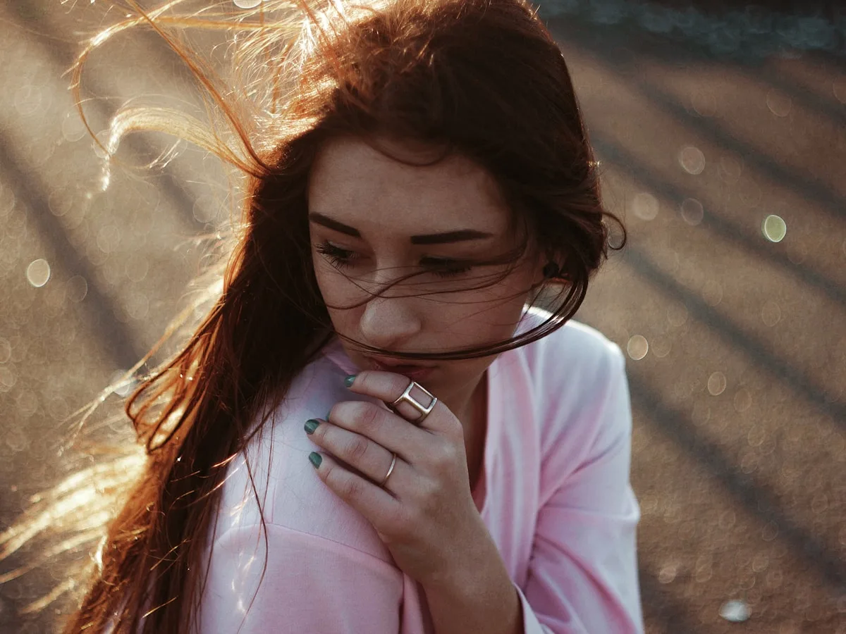 Lifestyle portrait in natural outdoor light — candid and warm